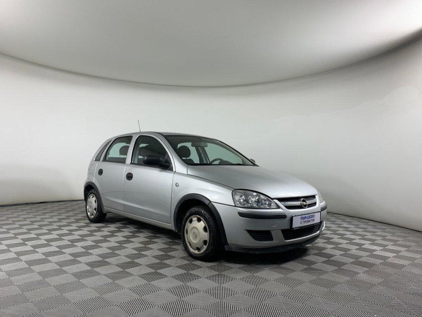 Опель Корса голубая