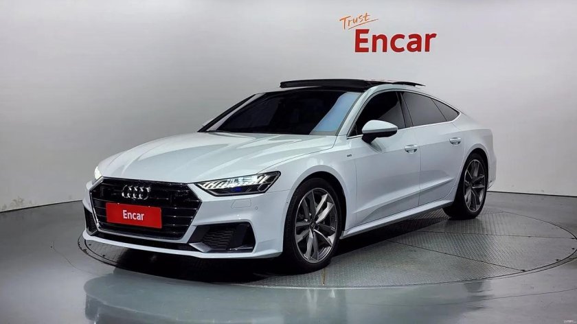 Белая ауди а 7