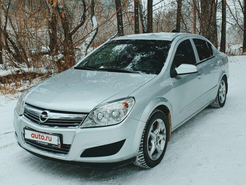 Опель серебристый