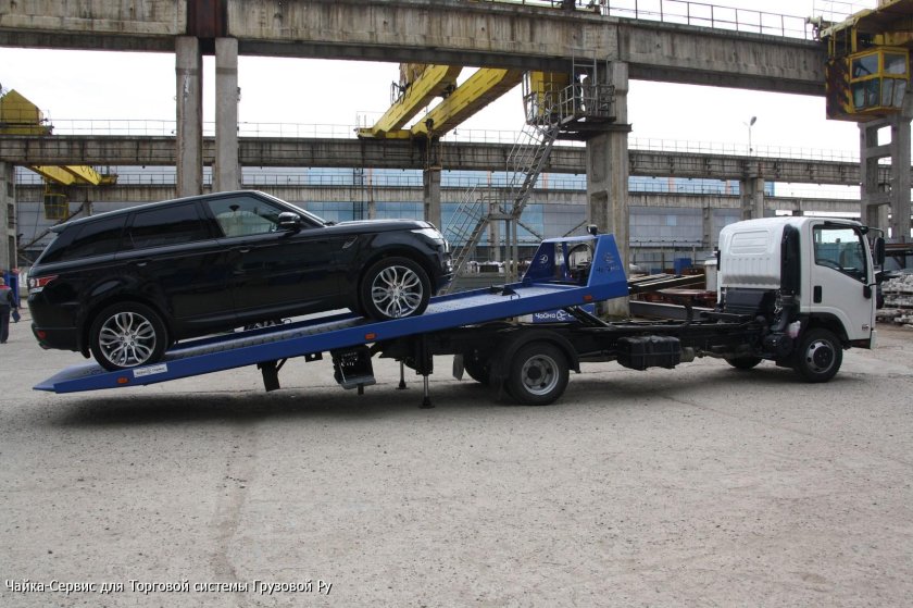 Isuzu эвакуатор со сдвижной платформой