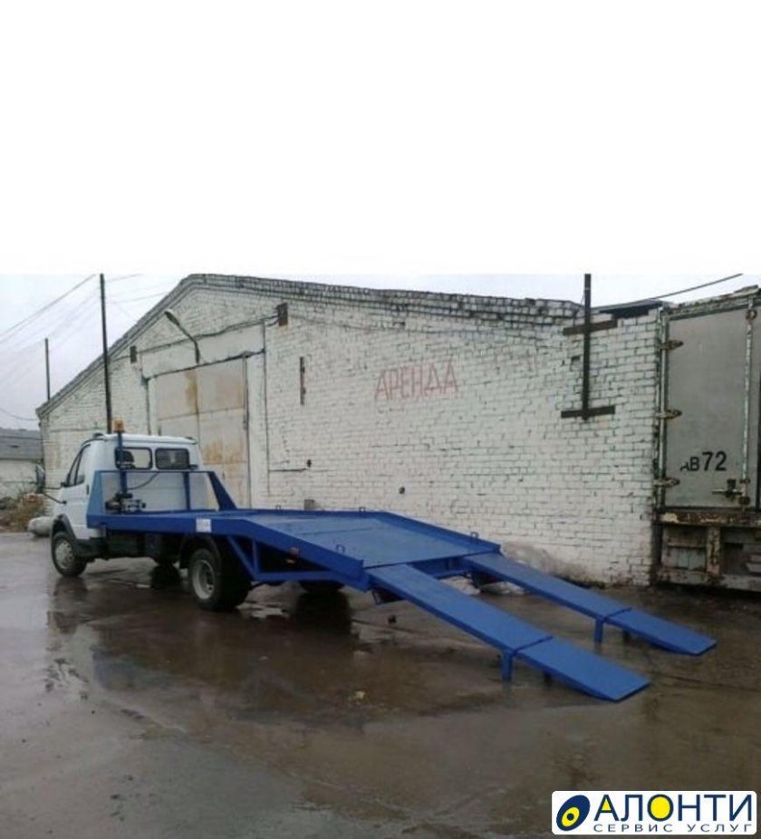 Эвакуатор с ломаной платформой Валдай-7