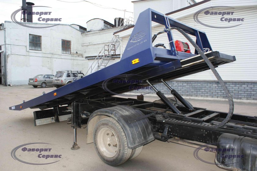 Исузу эвакуатор со сдвижной платформой