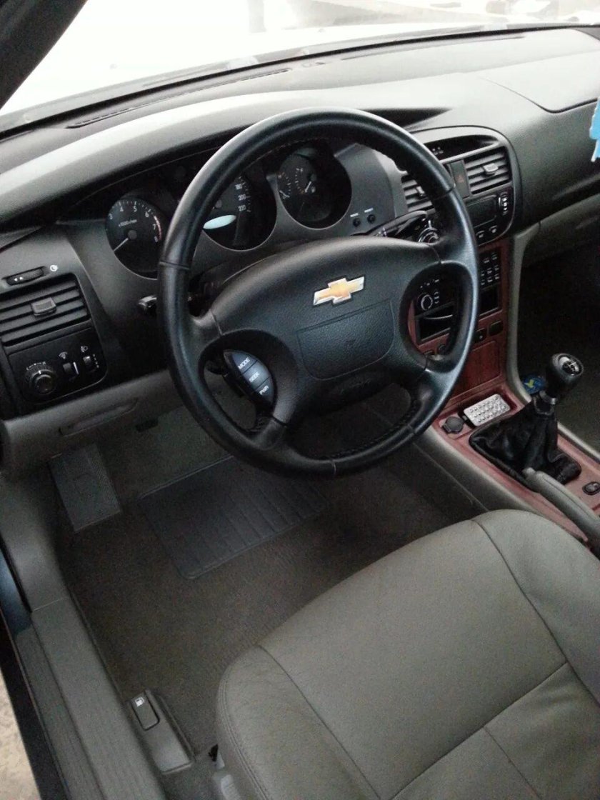 Шевроле Эванда 2005 2.0 салон