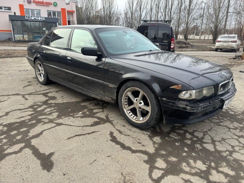 Бмв 7 серии е 38