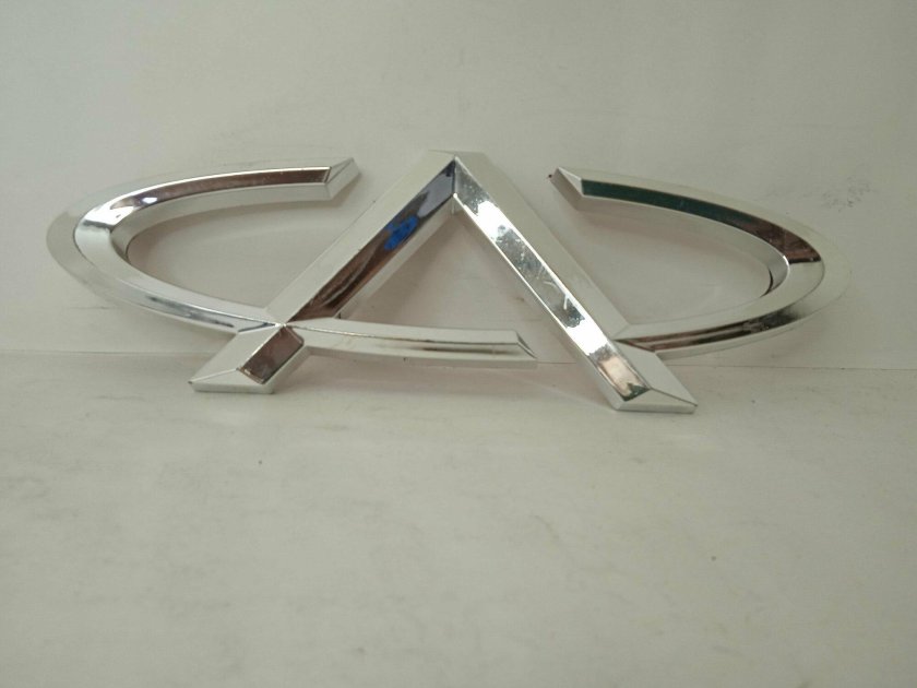 Эмблема решетки радиатора chery tiggo