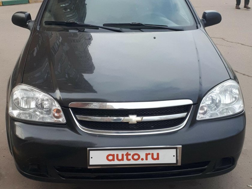 Черный Шевроле клан j200