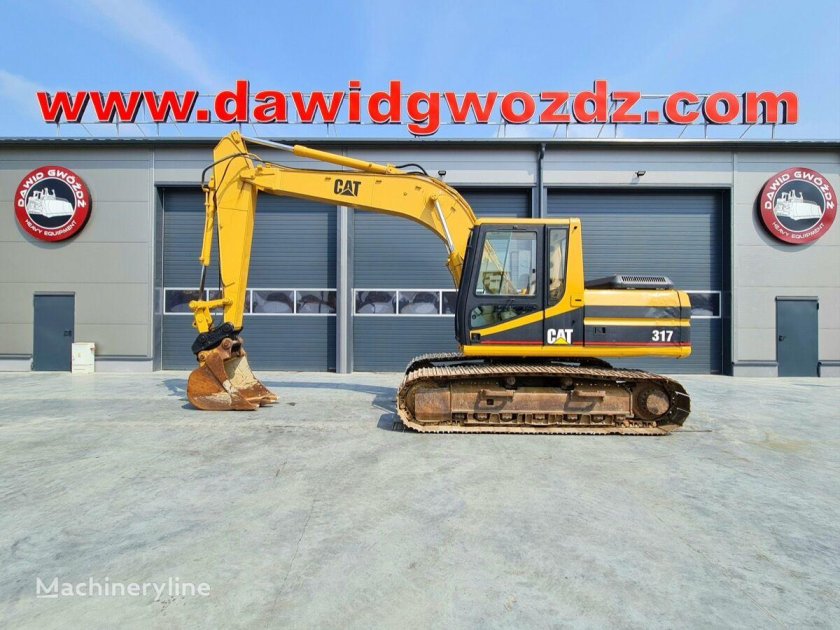 Гусеничный экскаватор jcb