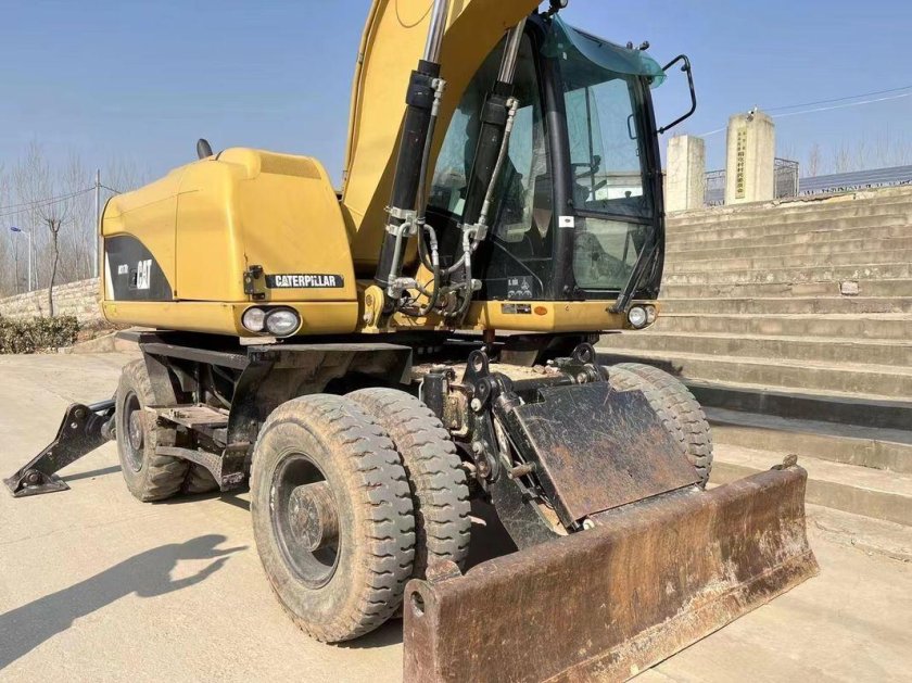 Колесный экскаватор