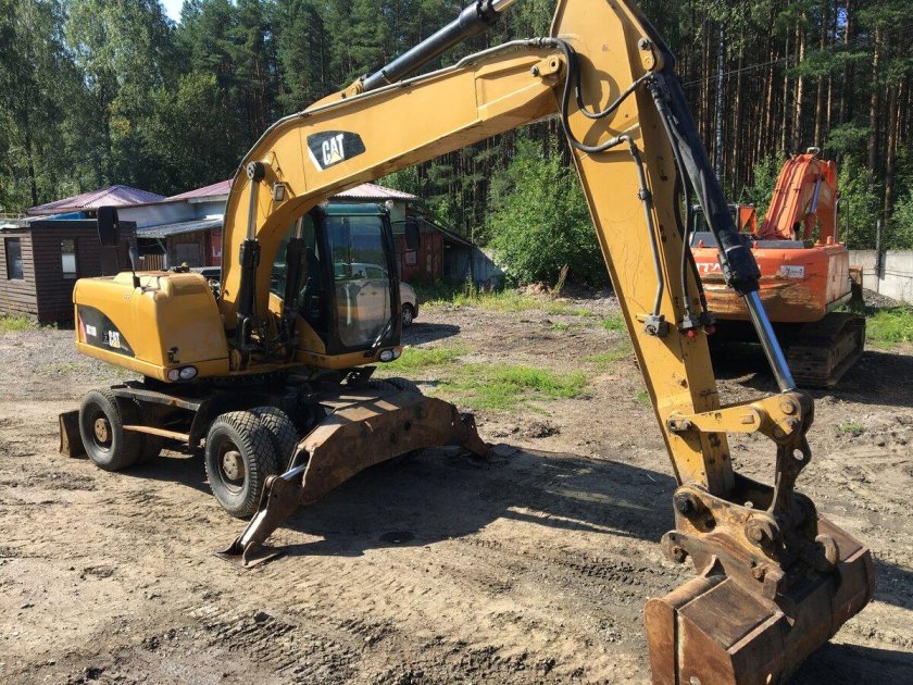 Полноповоротный экскаватор caterpillar m315