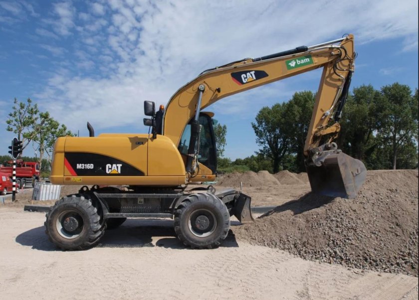 Экскаватор полноповоротный колесный Катерпиллер