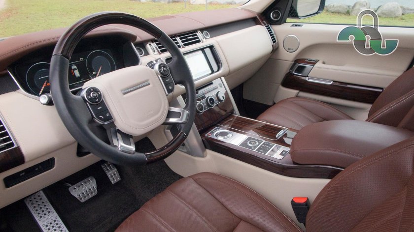 Рендж Ровер коричневый салон