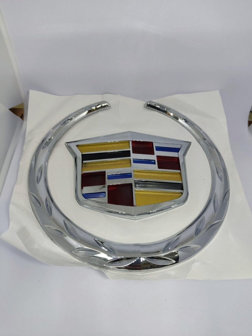 Эмблема кадиллак