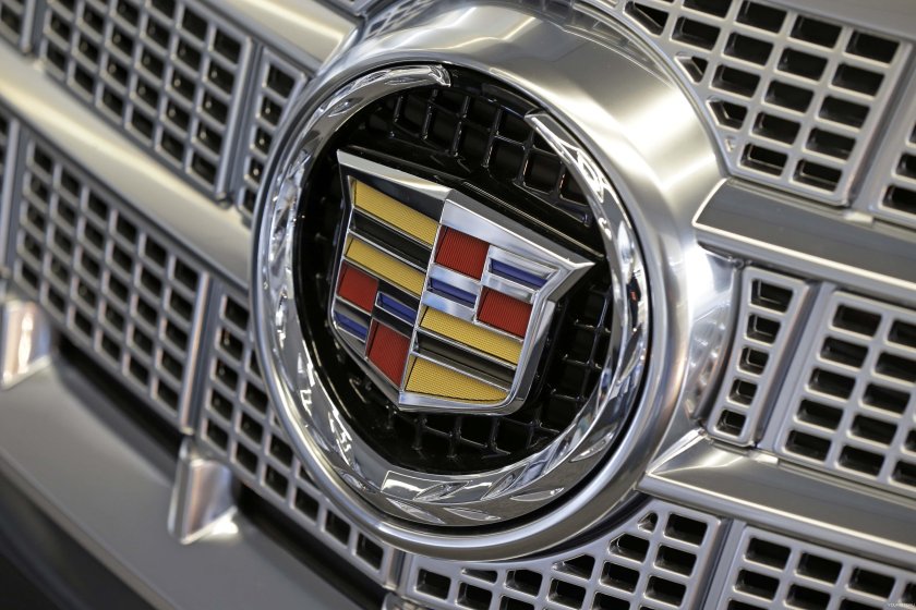 Значок Джили и Кадиллак