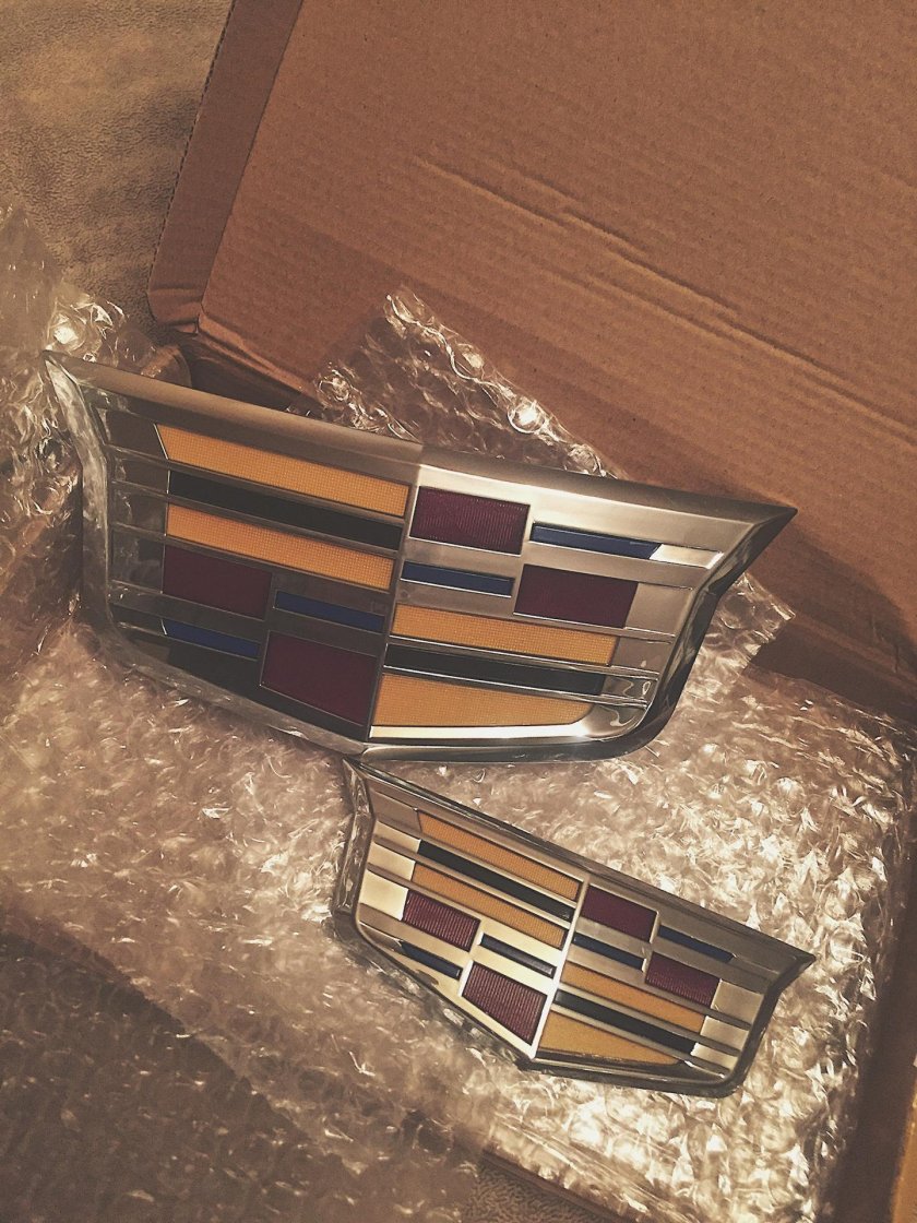 Кадиллак шильдик