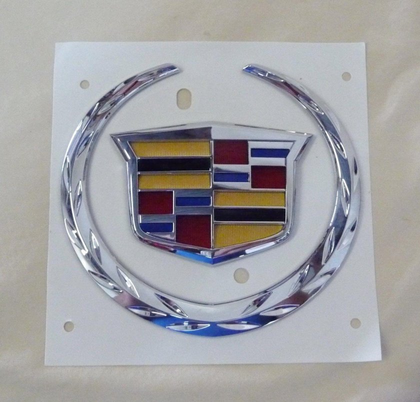 Кадиллак эскалейд значок