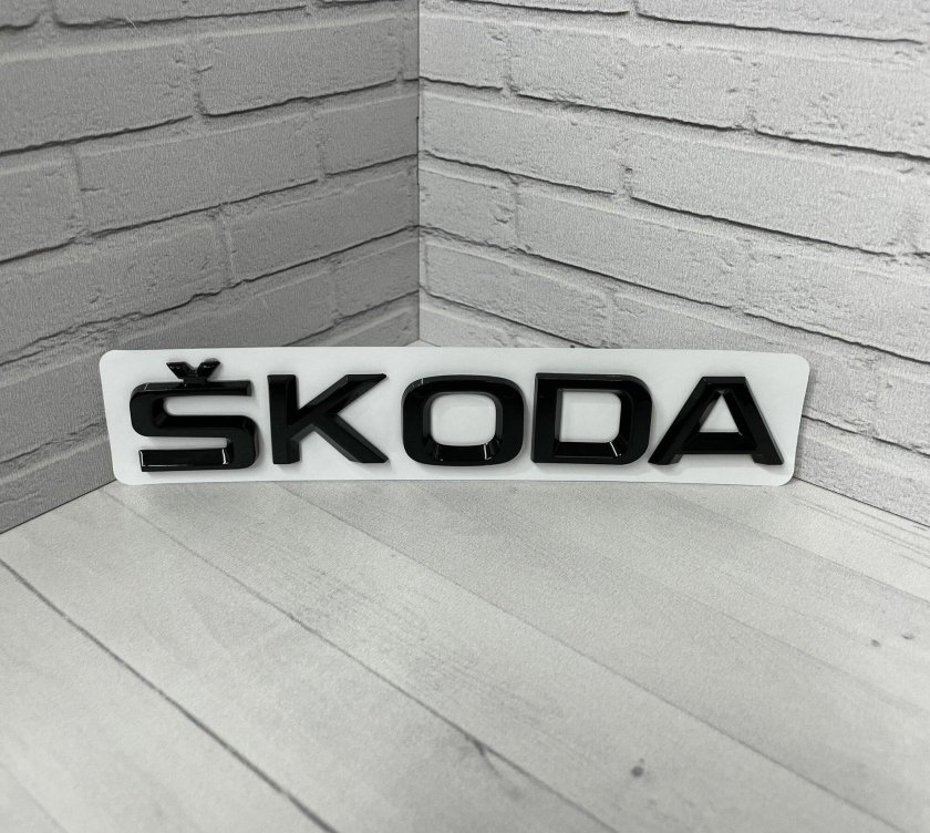 Эмблема skoda