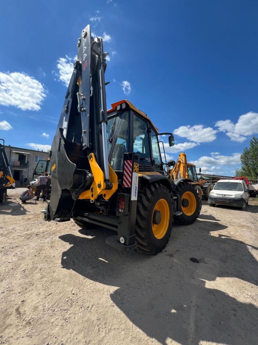 Экскаватор погрузчик mst