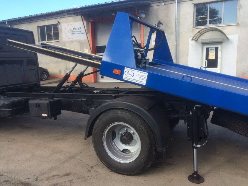 Газон Некст эвакуатор со сдвижной платформой