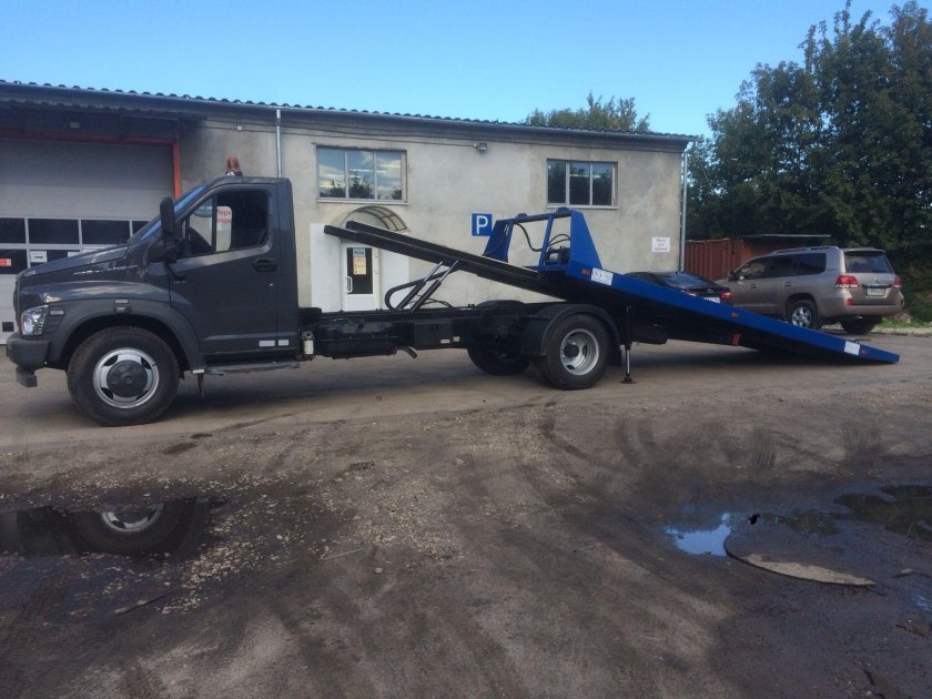 Эвакуатор газон next со сдвижной платформой