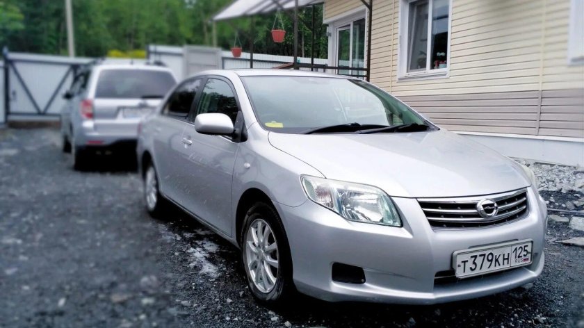 Королла Аксио 2009