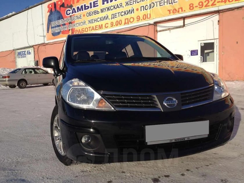 Ниссан тиида 2011 черный седан вин