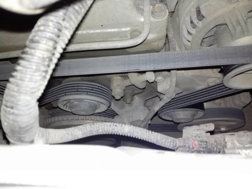 Натяжитель ремня генератора Нива Шевроле