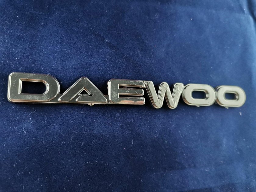 Эмблема Дэу