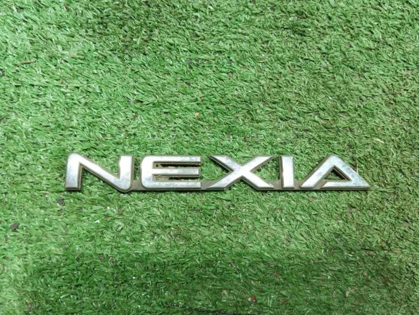 Логотип дэу нексия