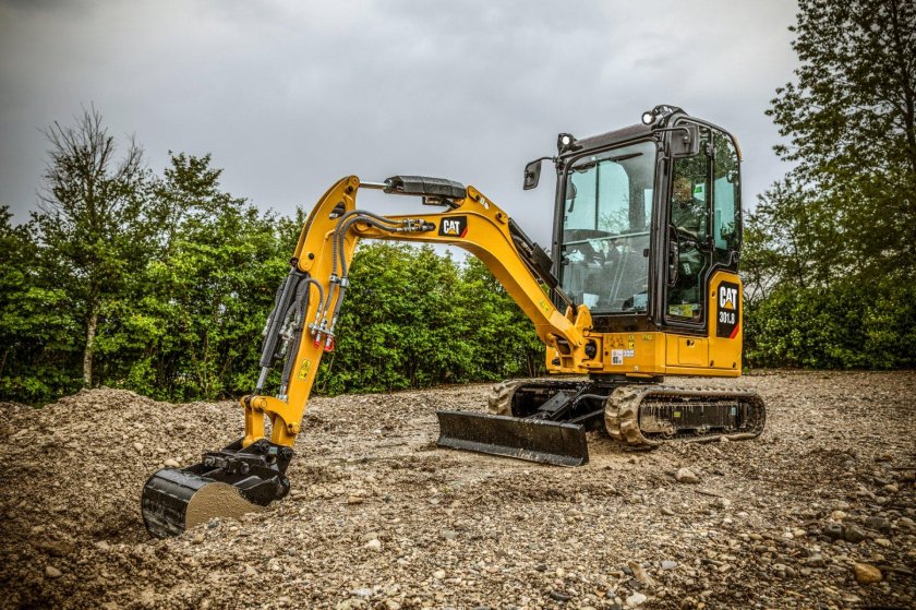 Мини экскаватор Катерпиллер