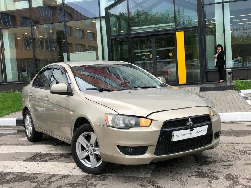 Mitsubishi Lancer 10 бежевый