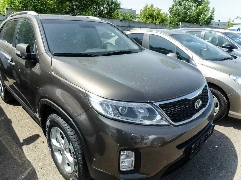 Киа Соренто серый