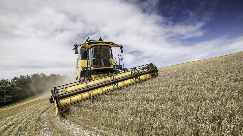 Комбайн Нью Холланд
