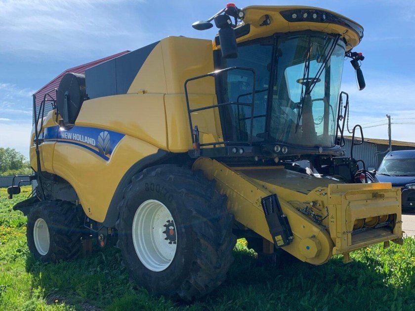 Комбайн нью холланд