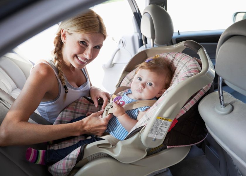 Ребенок в детском кресле