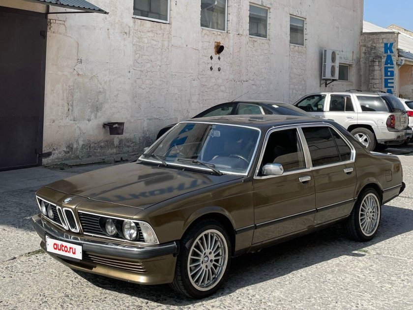 Бмв 7 е 23