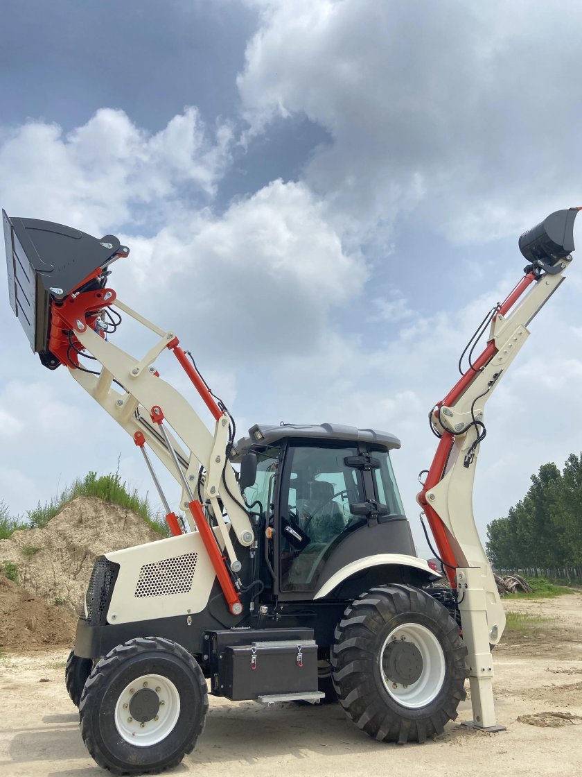 Фронтальный погрузчик экскаватор