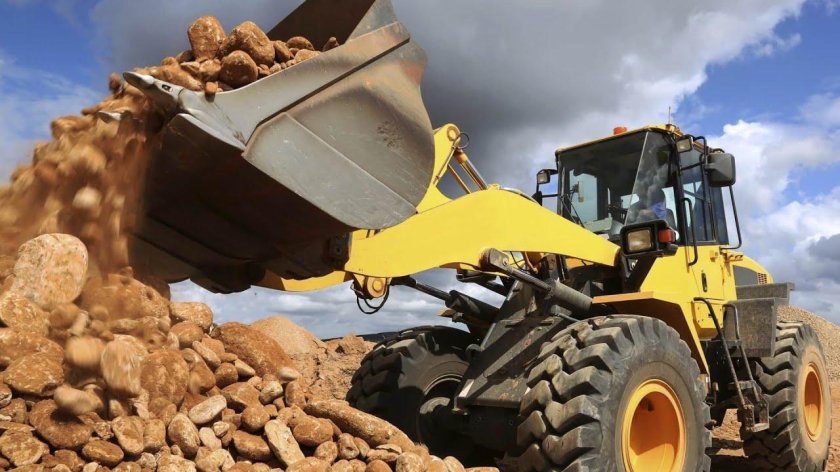 Фронтальный погрузчик экскаватор