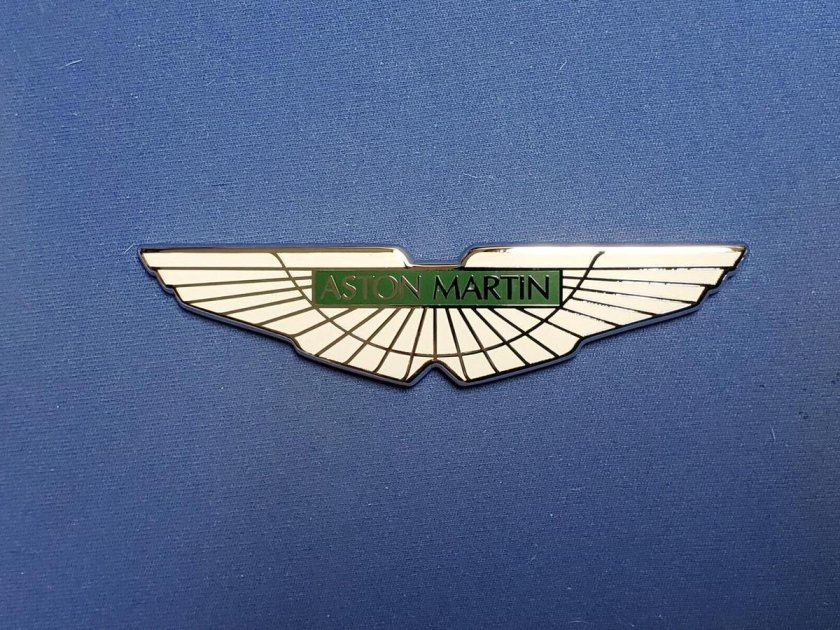 Астон мартин знак