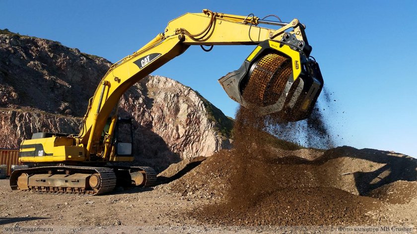 Катерпиллер экскаватор