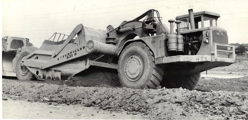 Скрепер Катерпиллер