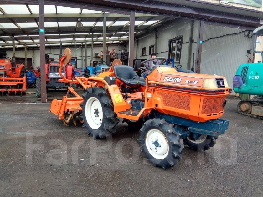 Минитрактор Кубота с фрезой