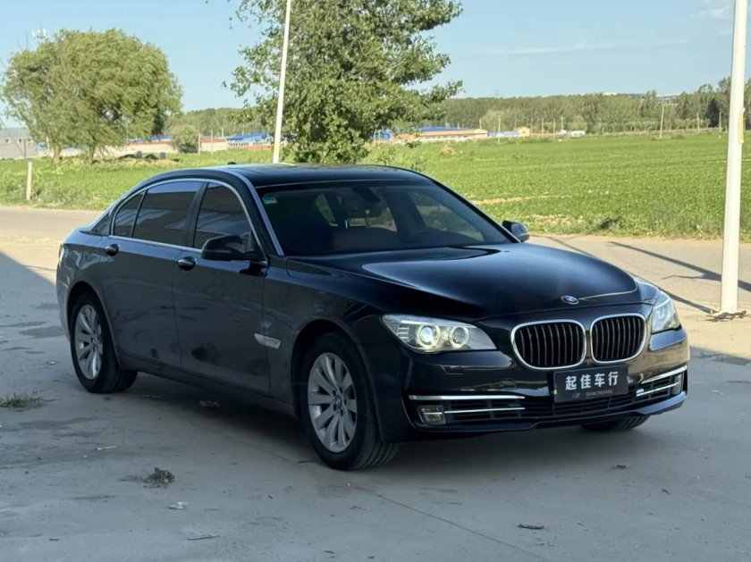 Бмв 740 2014