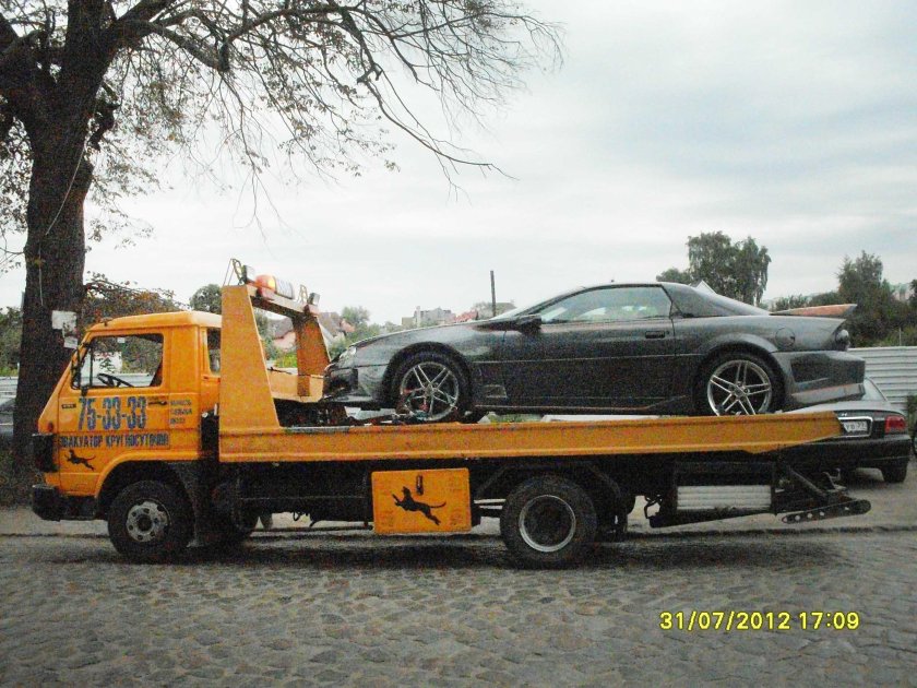 Man8.163 эвакуатор