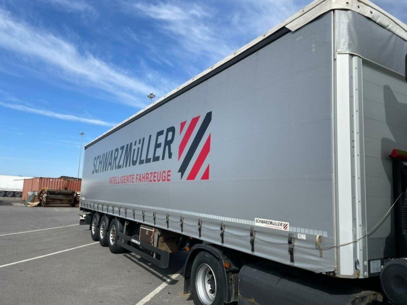 Бортовой полуприцеп шварцмюллер