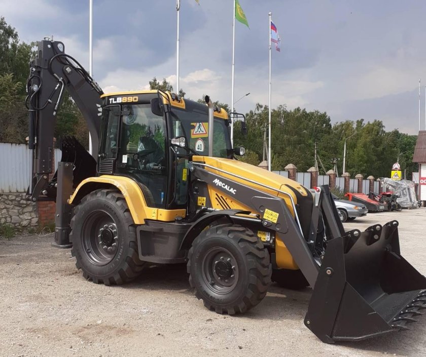 Украинский экскаватор погрузчик