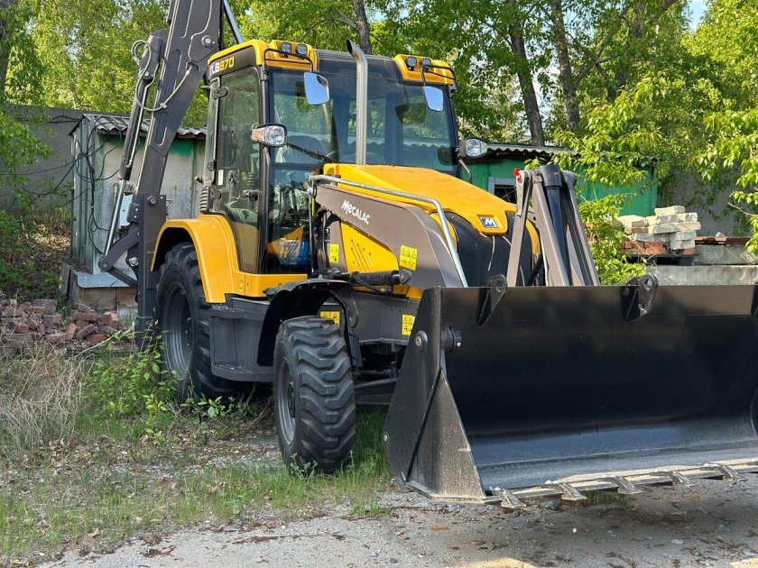 Экскаватор погрузчик мекалак 890