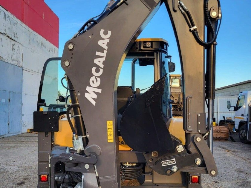 Экскаватора погрузчика