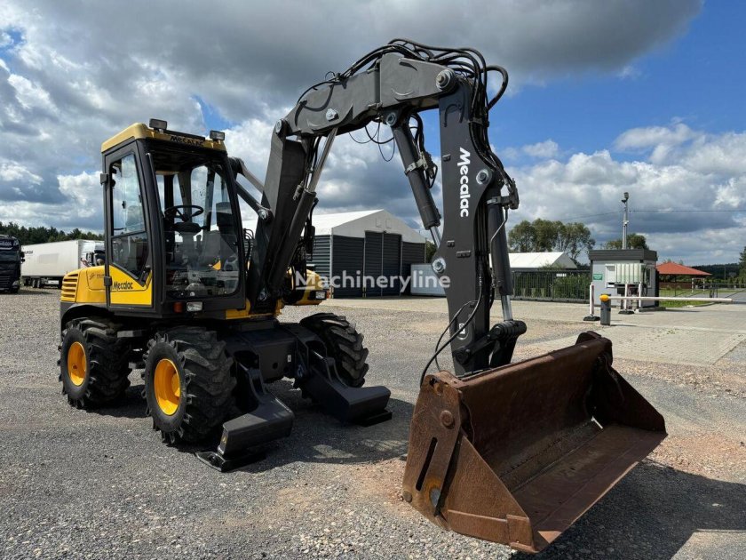 Экскаватор колесный