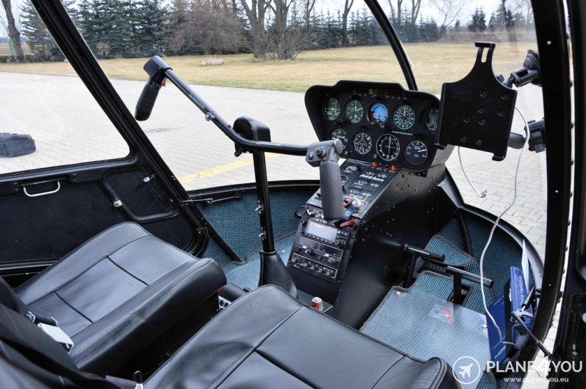 Кабина вертолета Robinson r44