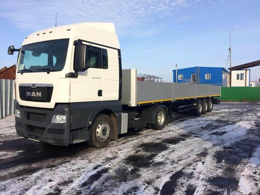 Ман ТГС С бортовым полуприцепом